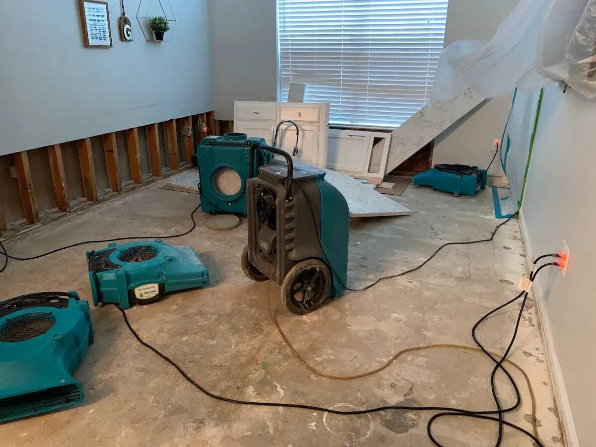 Dehumidifier in flood-cut room for Water Damage Restoration in Mayfield